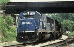 CR 6740 leads a CSX freight west beneath NS's overpass